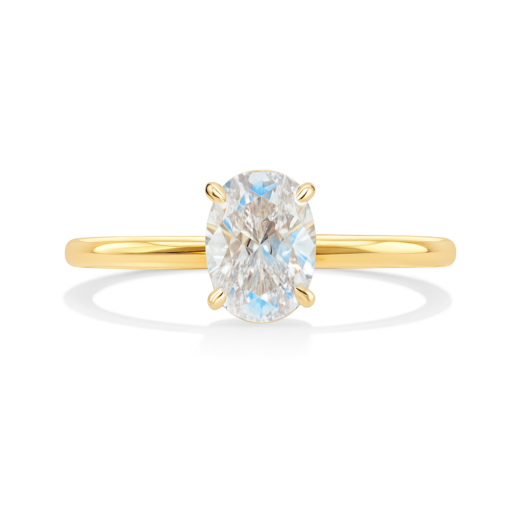 Oval cut lab grown VVS1 diamond engagement ring in yellow gold with a minimalist solitaire setting, ideal for timeless elegance.