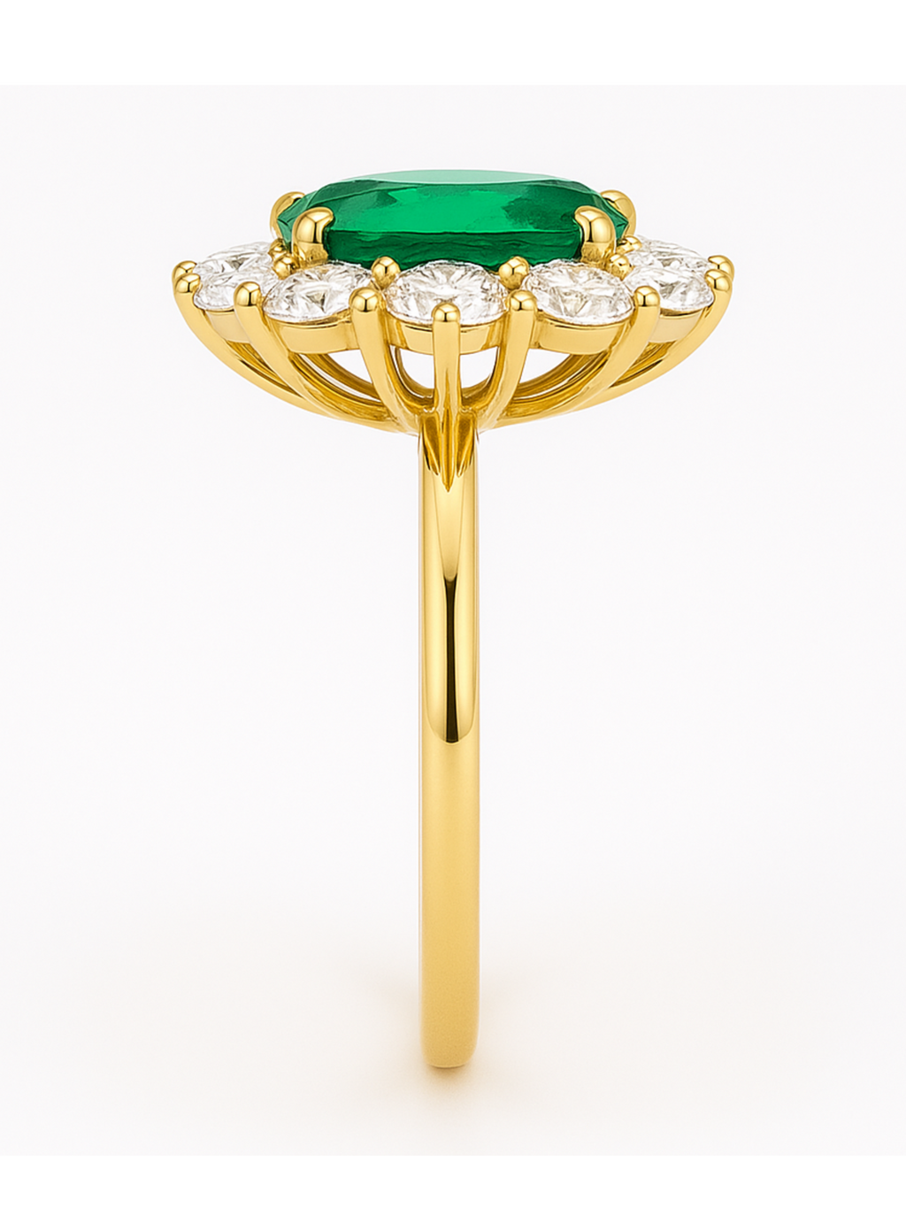 Side view of Oval Cluster Emerald and Diamond Gold Ring featuring a vivid green emerald surrounded by diamonds in a gold setting. Elegant fine jewelry piece.