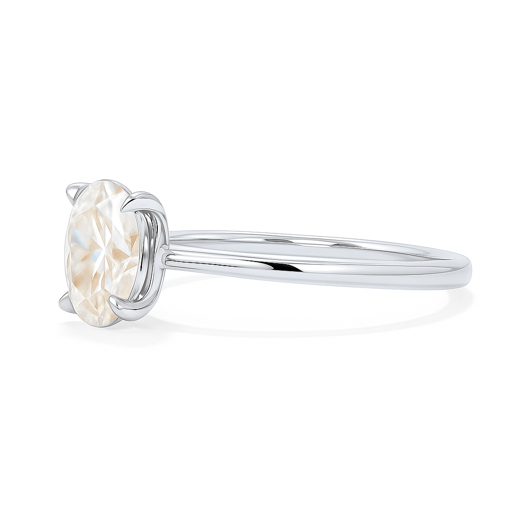 Side angle of platinum oval cut engagement ring with a lab grown VVS1 diamond, emphasizing its refined and delicate design.